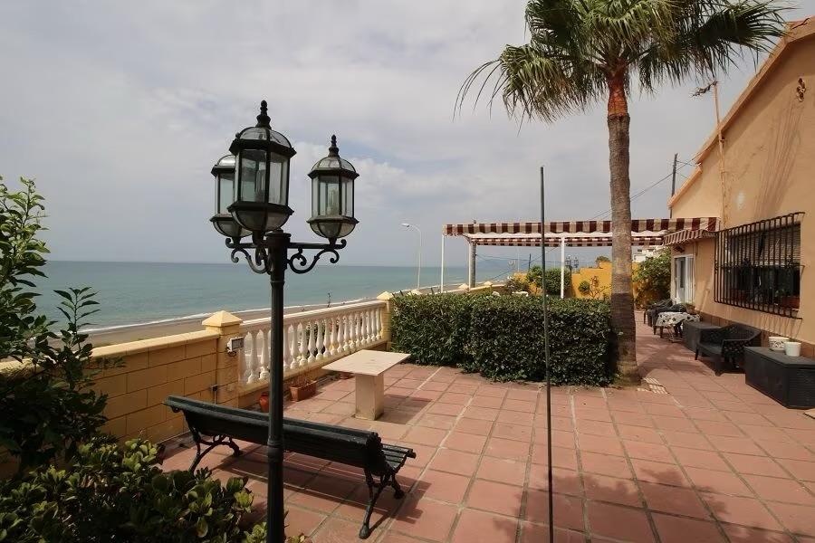 Beachfront Villa in Benajarafe with Large Urban Plot