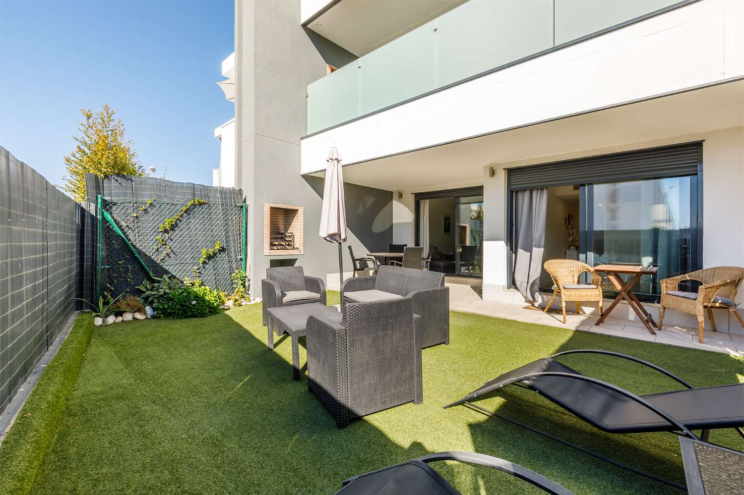 Appartement de trois chambres, avec jardin, barbecue et piscine communautaire à côté de la plage de Puerto de la Caleta