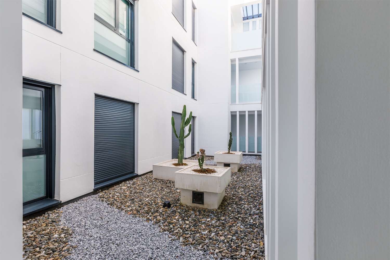 Appartement de trois chambres, avec jardin, barbecue et piscine communautaire à côté de la plage de Puerto de la Caleta