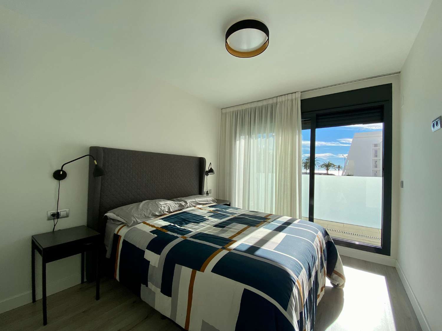 Two-bedroom apartment, with terrace, and community pool next to the beach of Puerto de la Caleta, available for winter